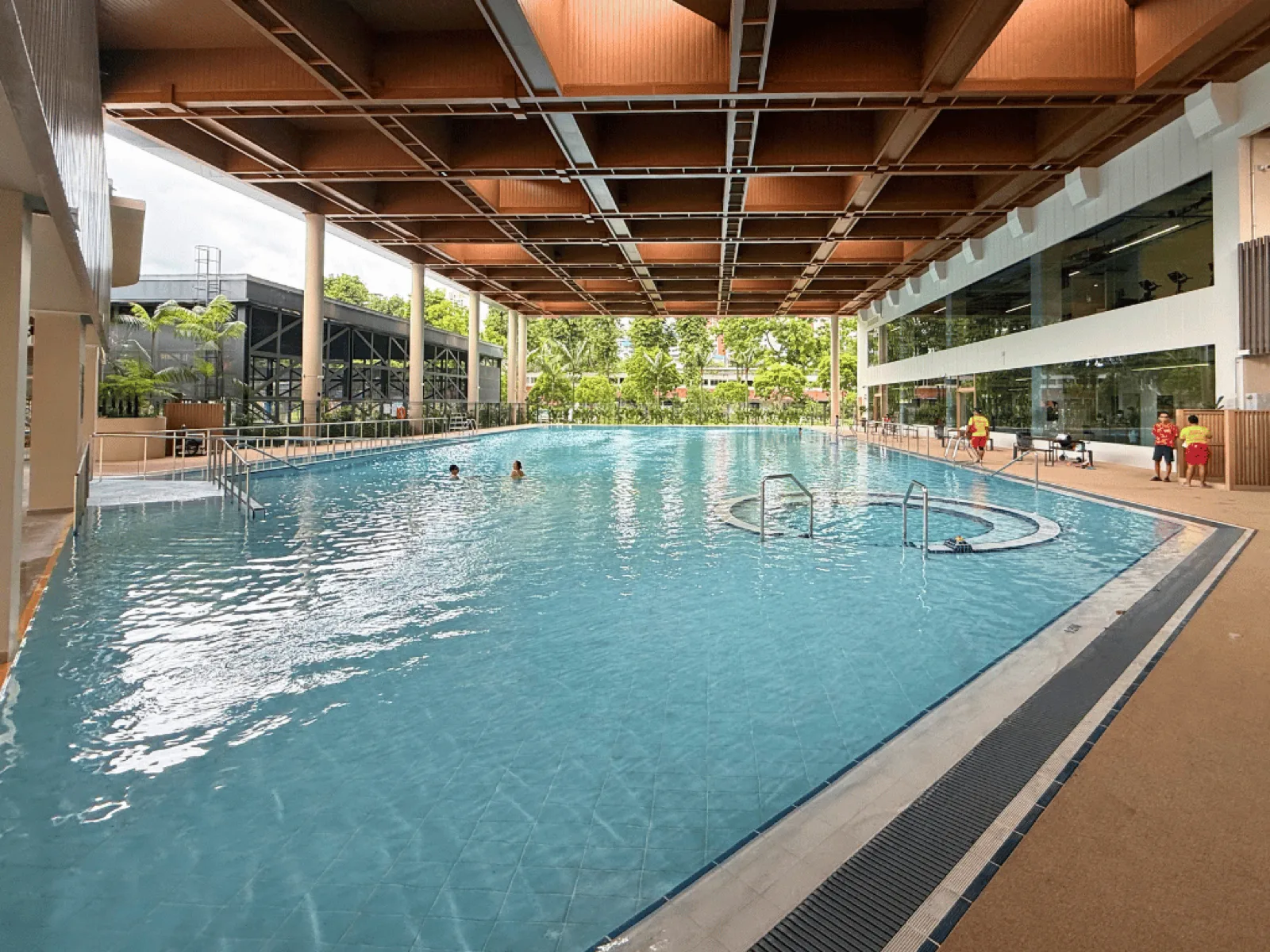 Sheltered multi-generational pool with jacuzzi and ramp access at Ang Mo Kio Swimming Complex